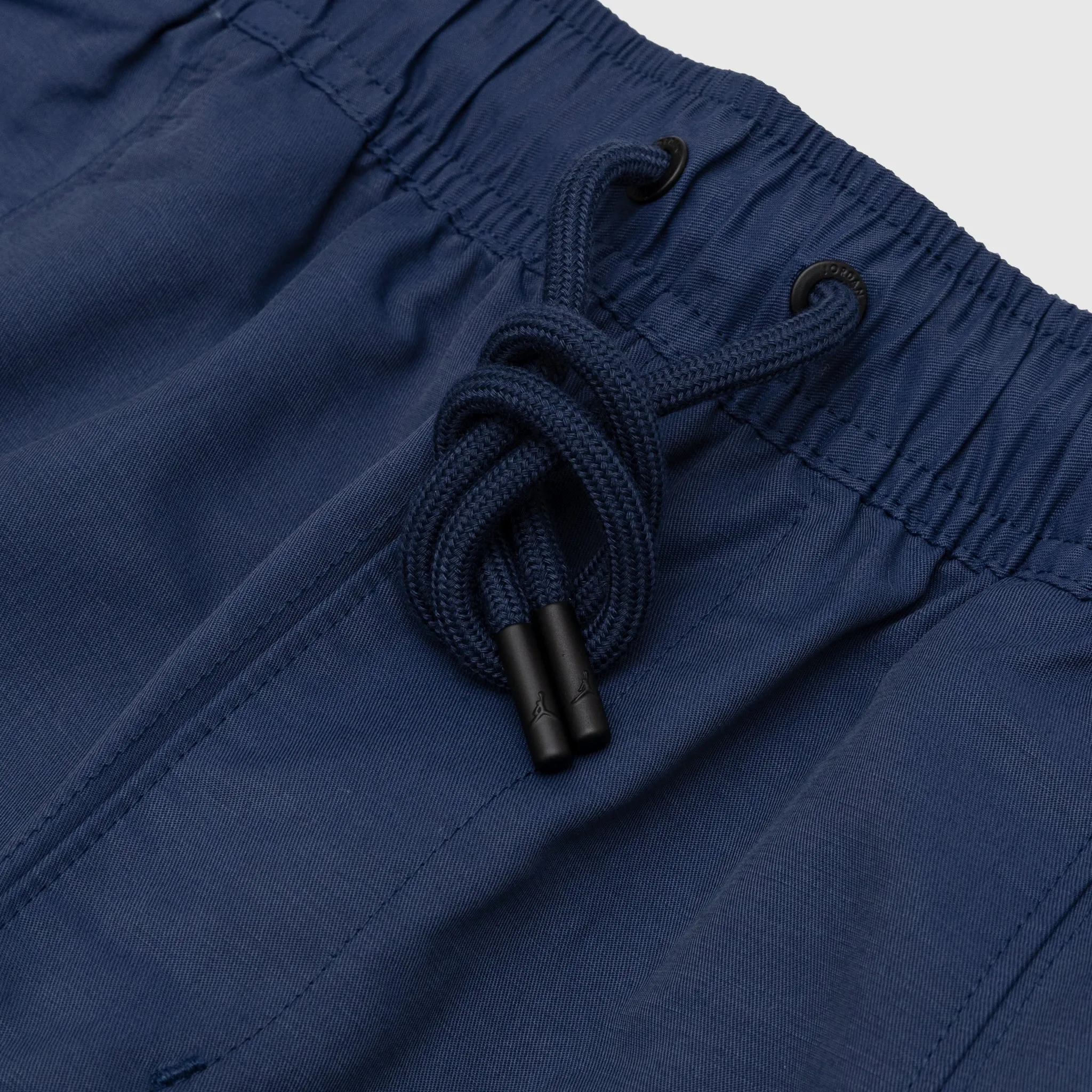 ESSENTIALS WOVEN PANT "MIDNIGHT NAVY"