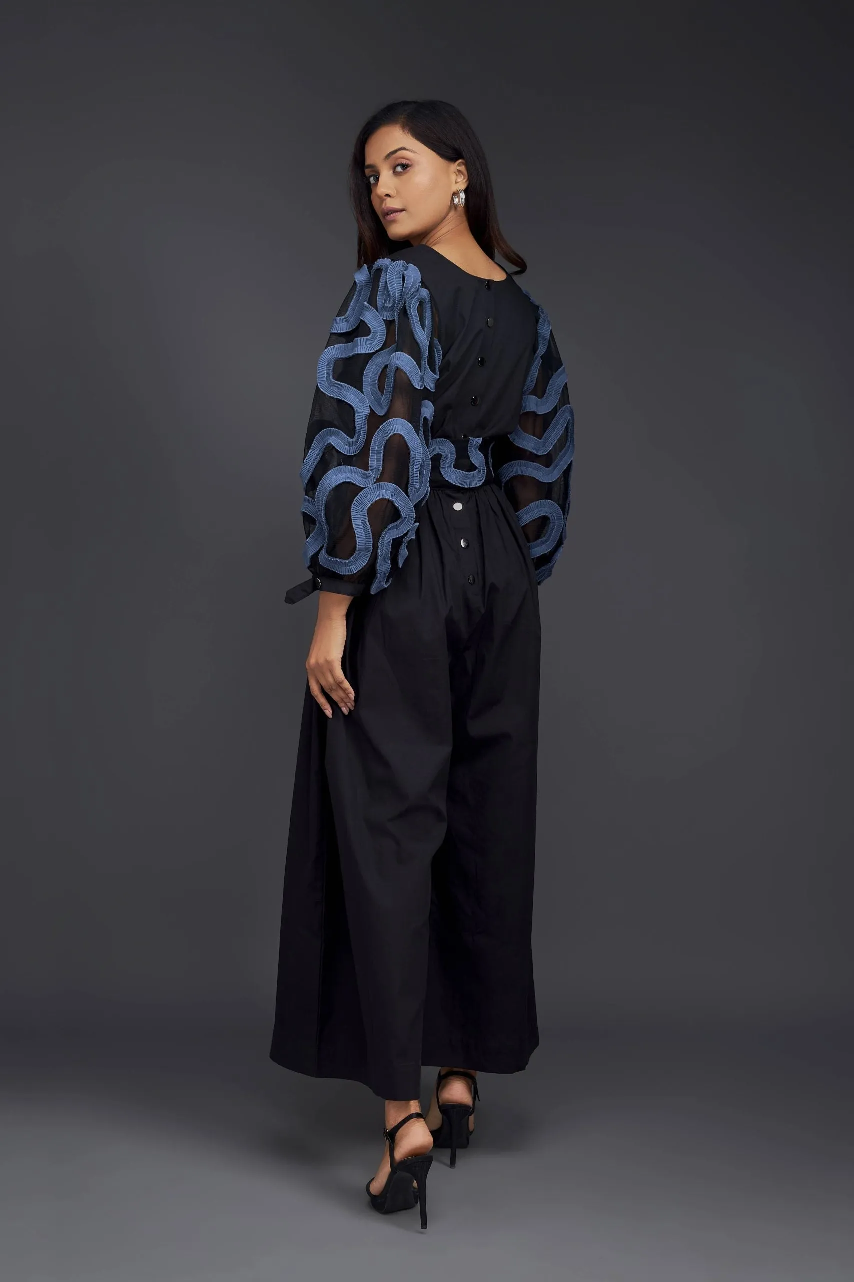 V NECK CULOTTE STYLE JUMPSUIT WITH PUFFED SLEEVES AND BLUE PLEATED FRILL DETAILING